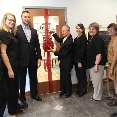 A ribbon-cutting at the practice